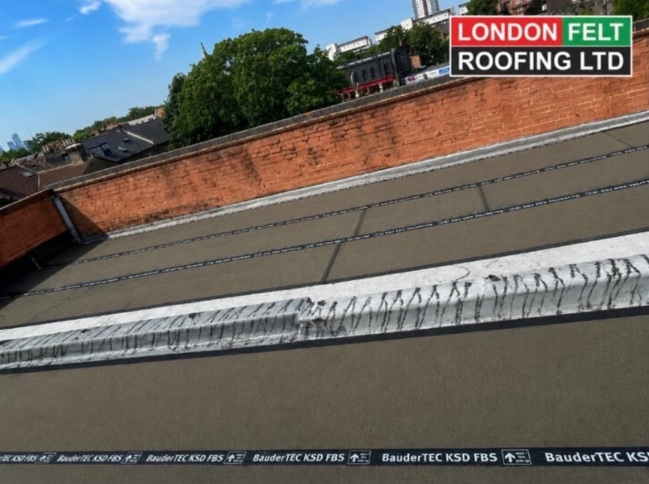 Mineral cap sheet and GRP trim installed on the roof
